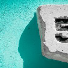 numeral 5 carved into a stone