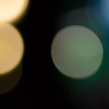 points of light in soft focus against dark background