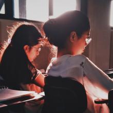 Students sitting at desks in a classroom